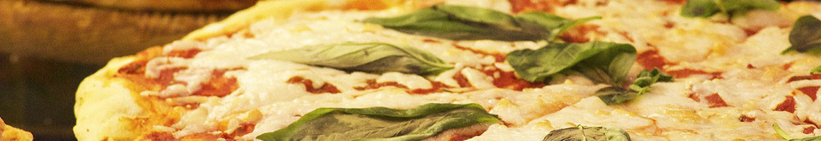 Eating Pizza at Papa Jimmy's Pizzeria restaurant in Cottage Grove, WI.